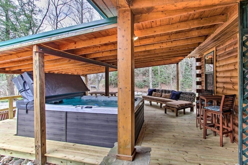 The deck at hot tub at Creekside Cabin in Gatlinburg - a great pet friendly option for groups.