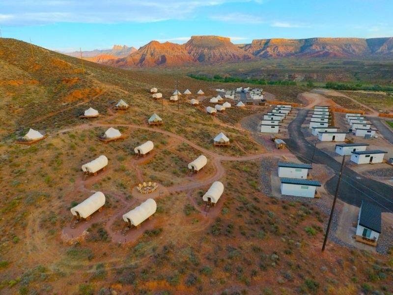 Aerial view of Zion Wildflower glamping site with tent and covered wagon lodging