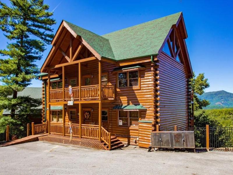 Large double-story true log cabin rental in Pigeon Forge with 8 bedrooms