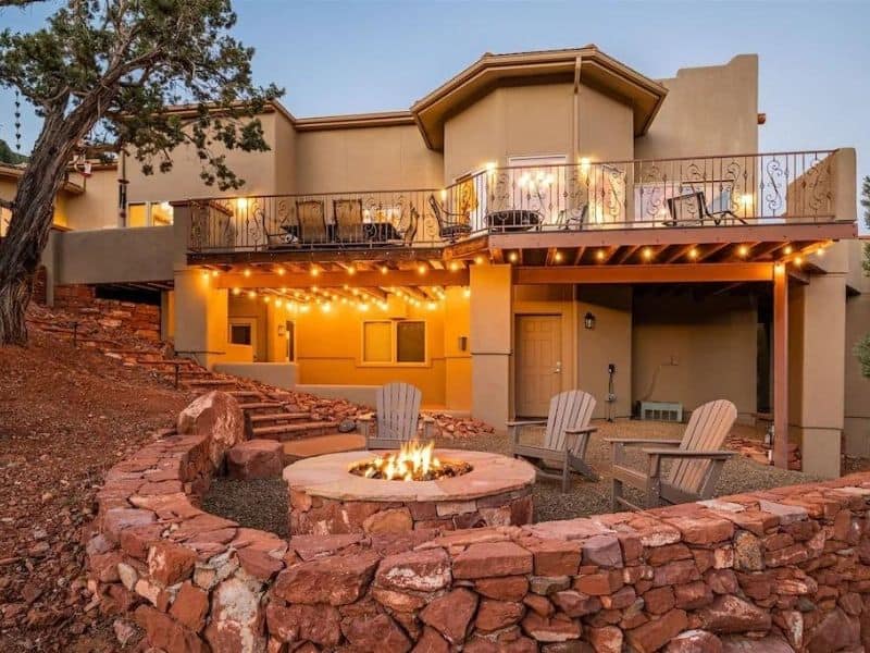 Exterior living area with fire pit at Sedona Luxury Airbnb