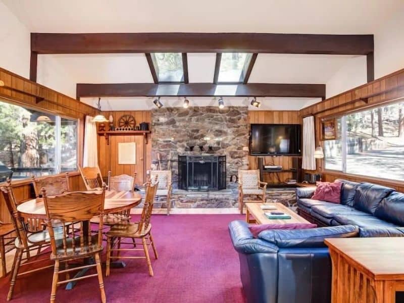 Fireplace and living area at cabin rental near Yosemite