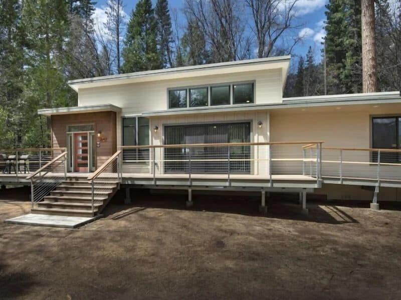 Exterior of white modern cabin rental in Wawona - Yosemite cabins