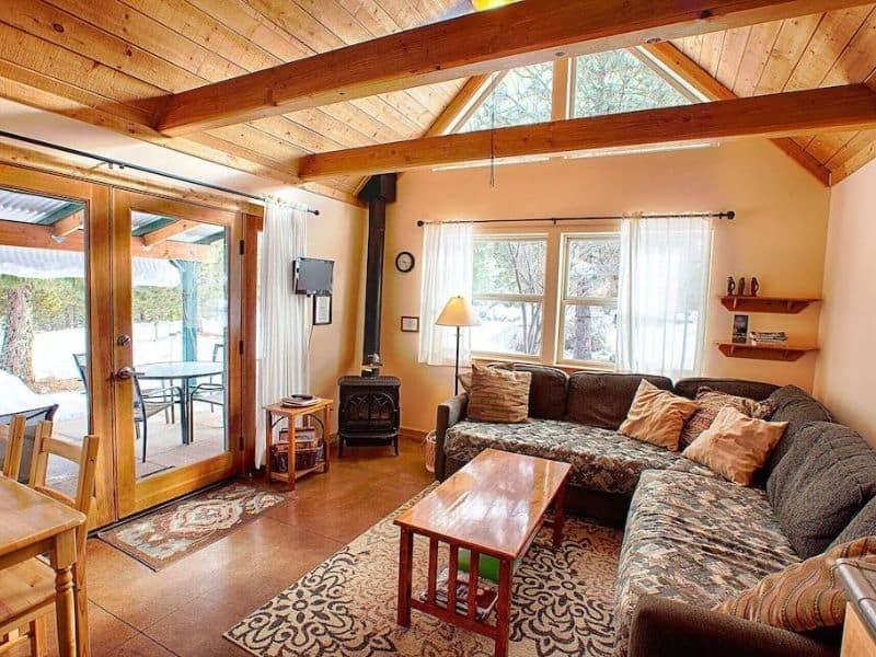 Interior of Yosemite Hilltop Cabin - living area with fireplace