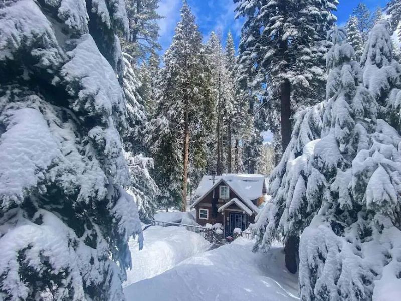 Wood cabin in the snow near Yosemite, CA