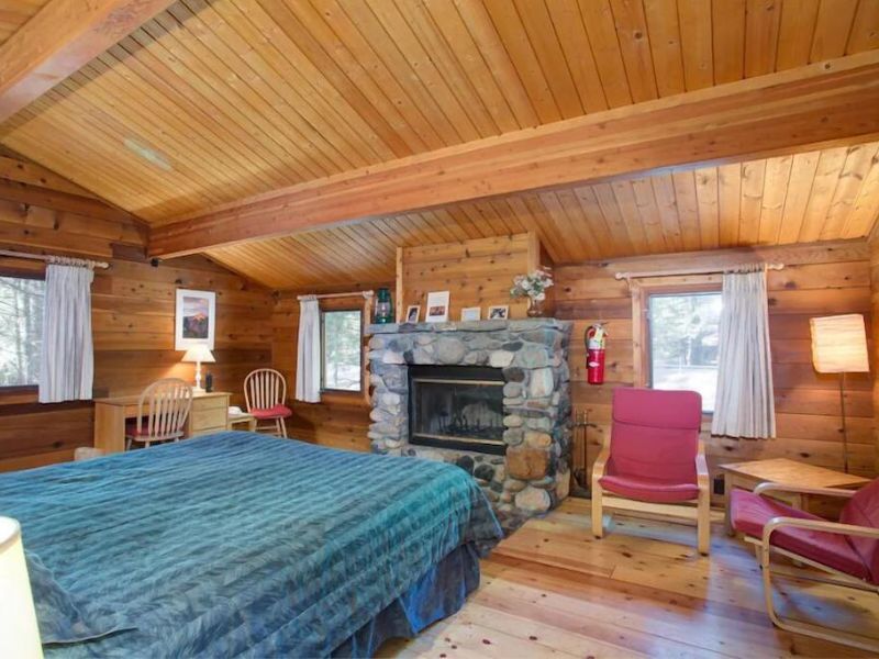 Master bedroom with fireplace in Yosemite cabin rental