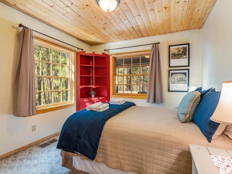 Bedroom with natural light at Yosemite cabin rental