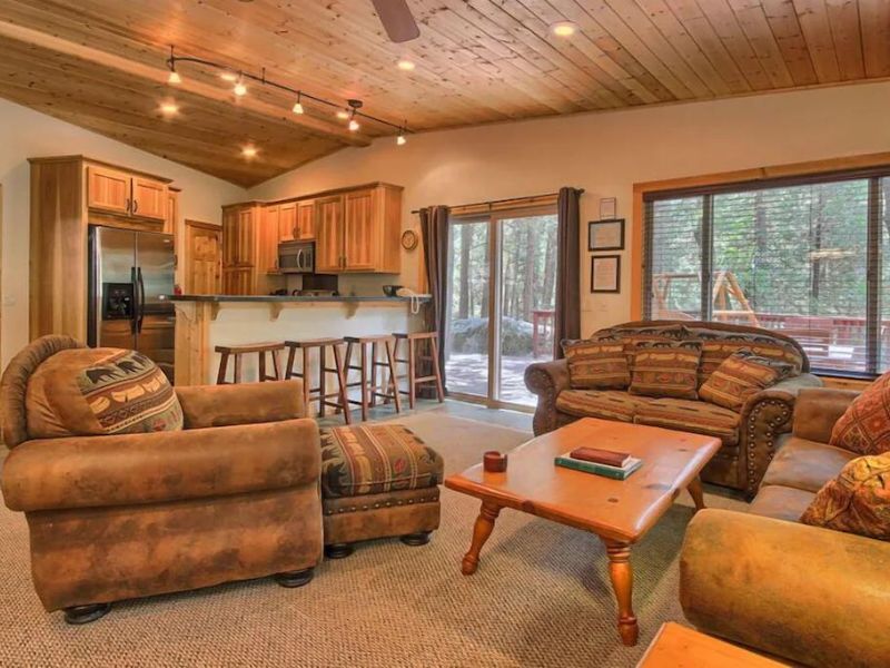 Living area and kitchen at cabin rental in Wawona near Yosemite