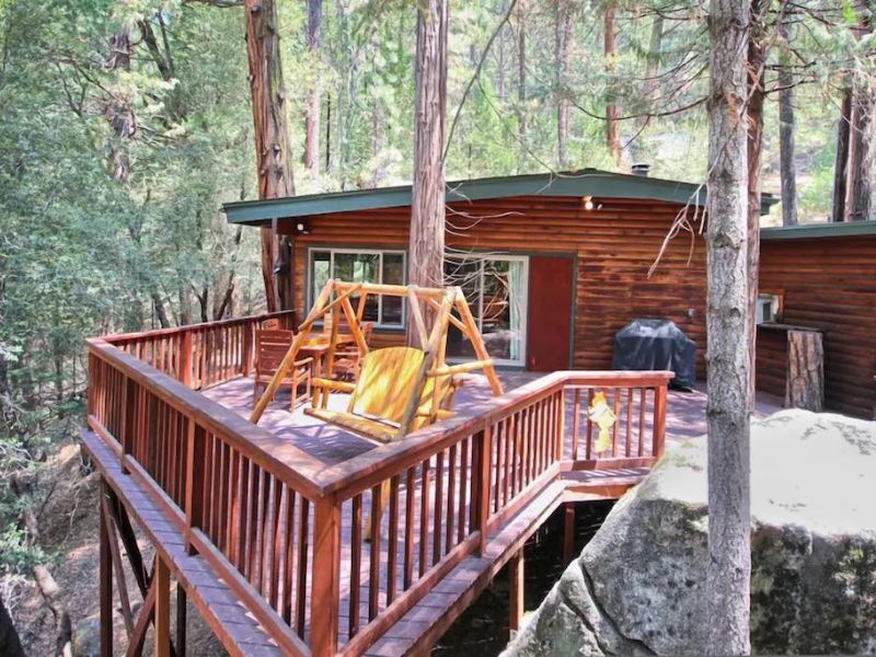 Outdoor raised deck at dog friendly Yosemite cabin rental