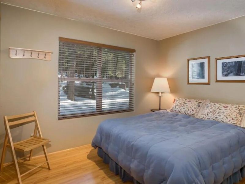Bedroom at 7S Wawona Chalet - a vacation rental near Yosemite