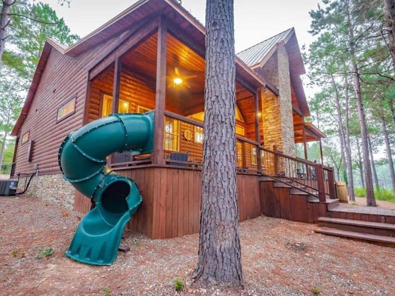5 bedroom log cabin in Broken Bow, OK with slide coming off deck