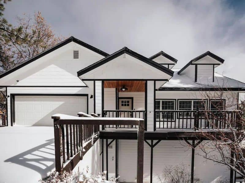 Exterior of white modern farmhouse cabin in Big Bear, CA