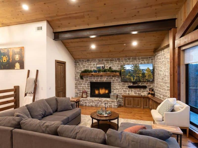 Cozy living area with fireplace at Big Bear cabin rental