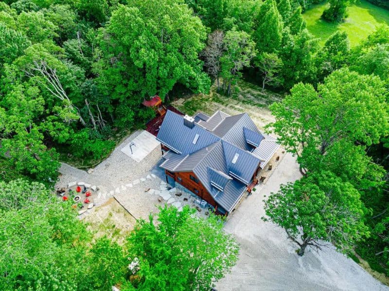 Aerial view of large 5-Bedroom Luxury Cabin rental in Hocking Hills surrounded by woodlands