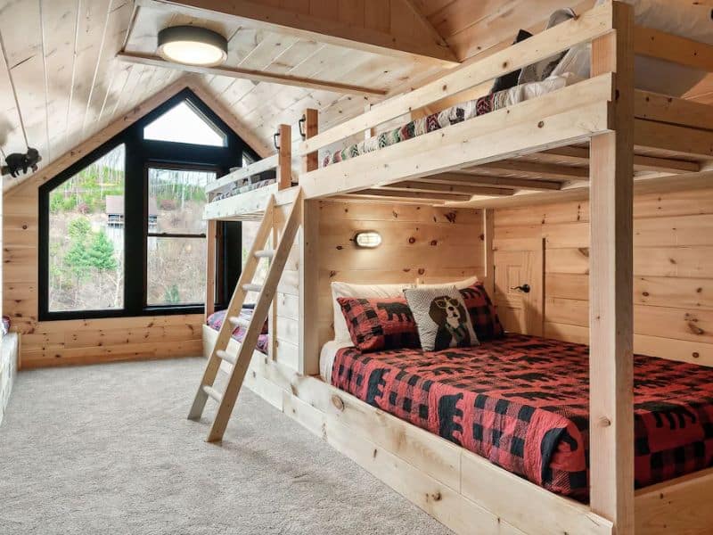 Kids bunk room in a cabin rental in Gatlinburg capable of hosting groups - part of a guide to the best large cabin rentals in Gatlinburg.