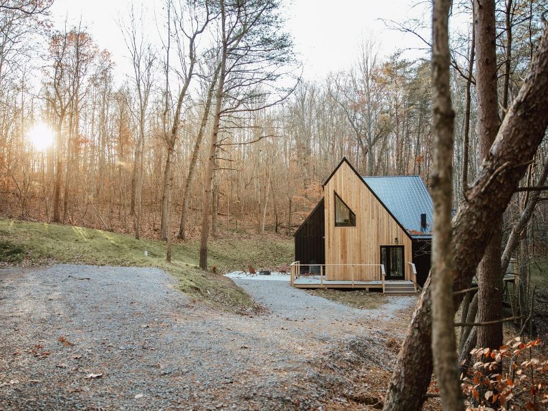 Container cabins in Hocking Hills are surrounded by trees.