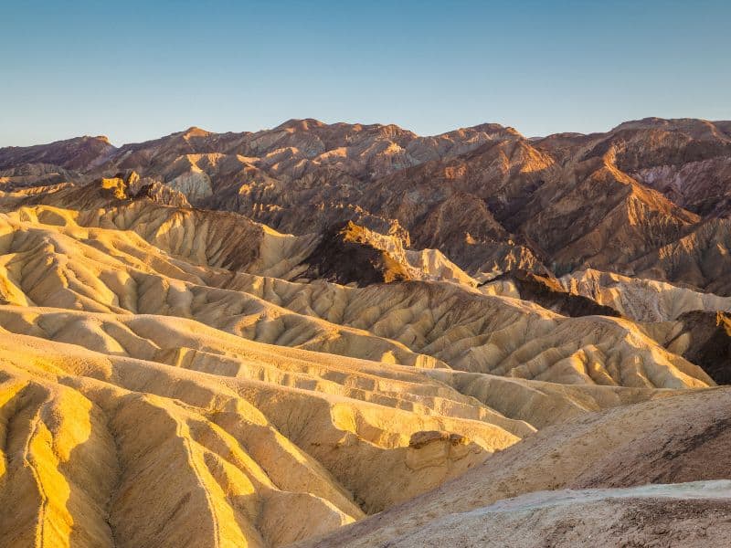 Zabriskie Point in Death Valley National Park in late afternoon.