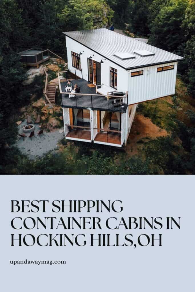 Aerial view of a modern shipping container cabin in Hocking Hills, Ohio. The cabin, prominently featured in the center, is surrounded by lush greenery, with a small outdoor sitting area and pathway leading down to a fire pit. The image includes text overlay at the bottom stating "Best Shipping Container Cabins in Hocking Hills, OH" with the website "upandawaymag.com" listed.